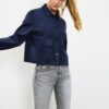 Jacke aus Kunstwildleder mit Taschen Jacke aus Kunstwildleder mit Taschen