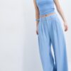 Rustikale Hose mit Wide Leg und verstellbaren Knöpfen