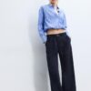 Wide Leg Hosen mit Schnallendetail Wide Leg Hosen mit Schnallendetail