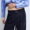 Wide Leg Hosen mit Schnallendetail Wide Leg Hosen mit Schnallendetail